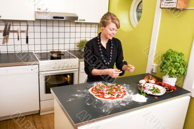 Young Female Making Pizza