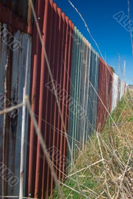 Dilapidated Roadside Corrugated Iron Fence