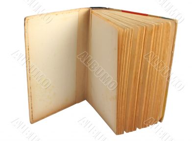 opened vintage book on white