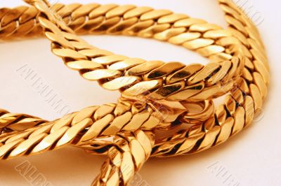 gold chain details on white