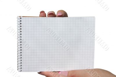hands holding blank spiral notebook
