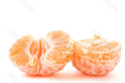peeled tangerines on white