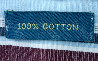 100% cotton - real macro of clothing label