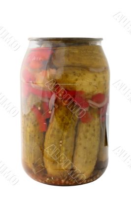 jar of pickled cucumbers with paprika