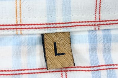 real macro of clothing label - SIZE L