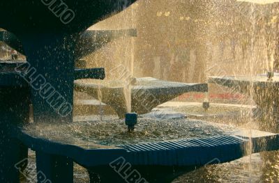 fountain against bright sun