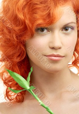 lovely redhead with bamboo