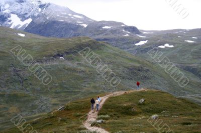 people on the mountain road