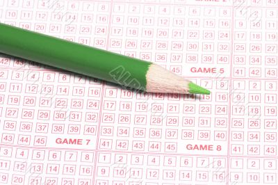 Lottery Ticket And Green Pencil