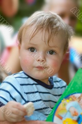 cute young boy eating