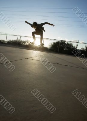 Teenage Skateboarder Airborne