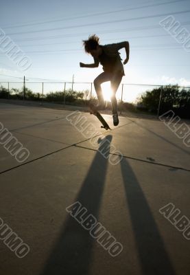 Teenage Skateboarder Doing Trick