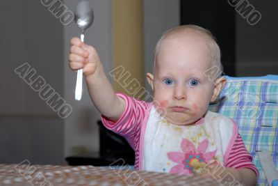 baby girl eating baby girl eating