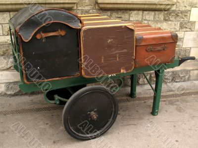old style luggage on trolley