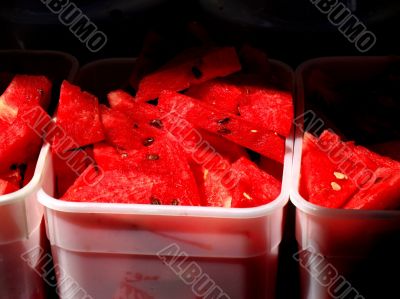 Slices of fresh watermelon caught in sunlight
