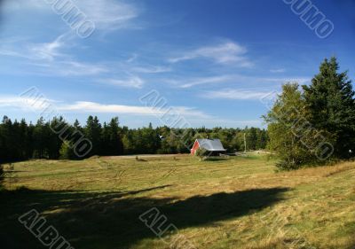 New England red barn and fence