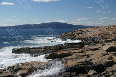 Breaking waves on granite ledges Breaking waves on granite ledges