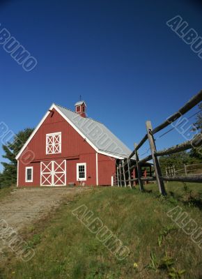 New England red barn and fence