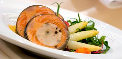 Atlantic Salmon around a scallop