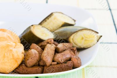 Liver, fried dumplings and banana