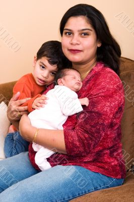 East Indian Woman with their son and infant daughter