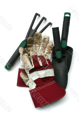 Used gardening / work gloves and tools