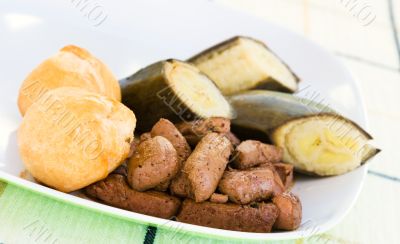 Liver, fried dumplings and banana