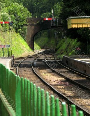 View over fence of rail tunnel