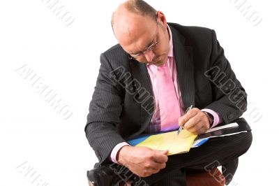 Businessman making calculations