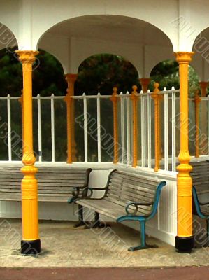 Bench in arched beach shelter