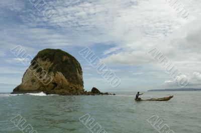 the latin man in boat on pacific
