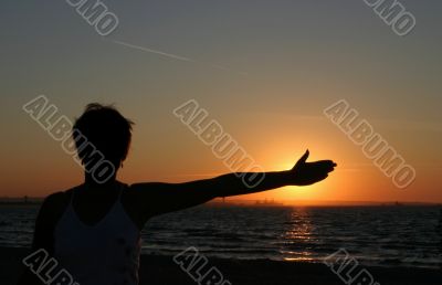silhouette against summer sunset