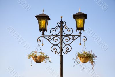 Golden lanterns with flowers