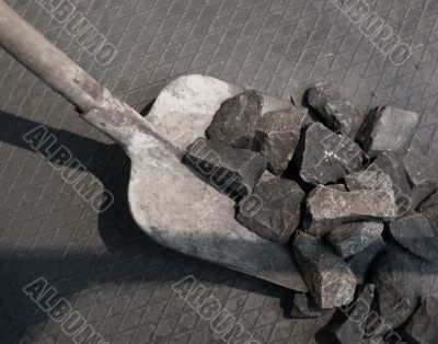 Shovel and stone