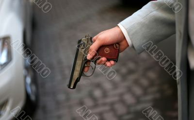 Pistol in a hand