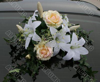Wedding car decorations with flower bouquet