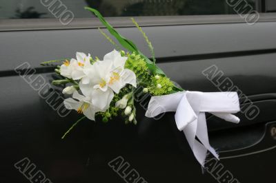 Wedding car decorations with flower bouquet