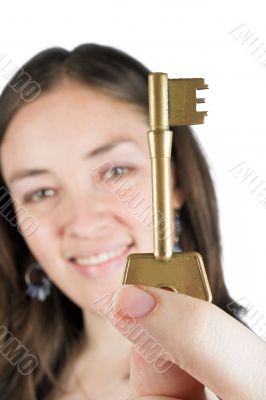 beautiful girl holding key of success