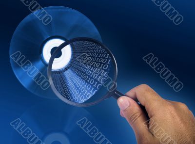 Cd details on a magnifying glass