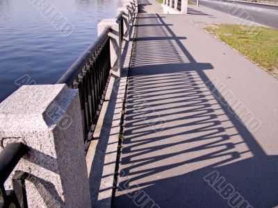 Parapet in quay river and shadow parapet.