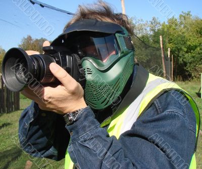 The outdoor photographer with protective mask