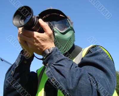 The outdoor photographer with protective mask
