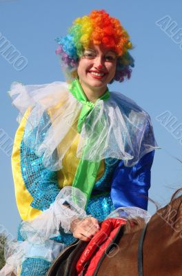 Equestrian clown in colored wig