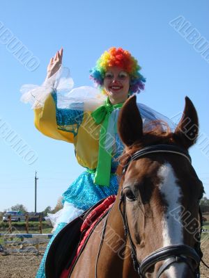 Equestrian clown in colored wig