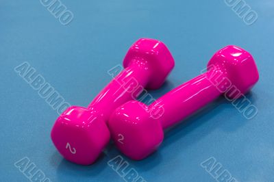 Pink dumbbells for fitness