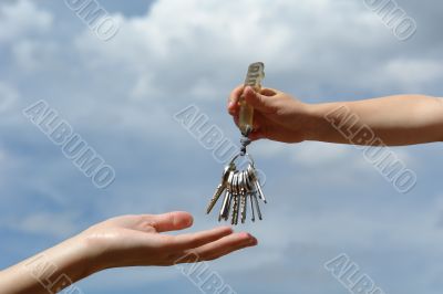 child`s hand with keys child`s hand with keys