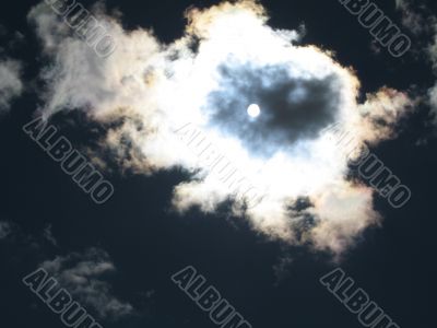 the moon in the clouds