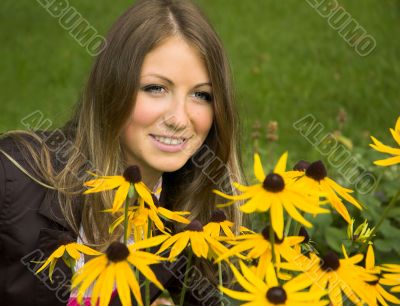 The girl close up among yellow colors
