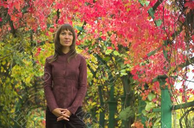 The beautiful girl in autumn park