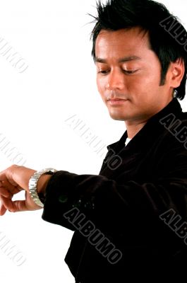 man looking at watch